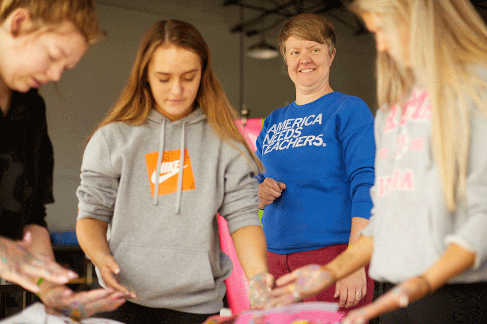 A photo of students and teachers working together at Iowa BIG